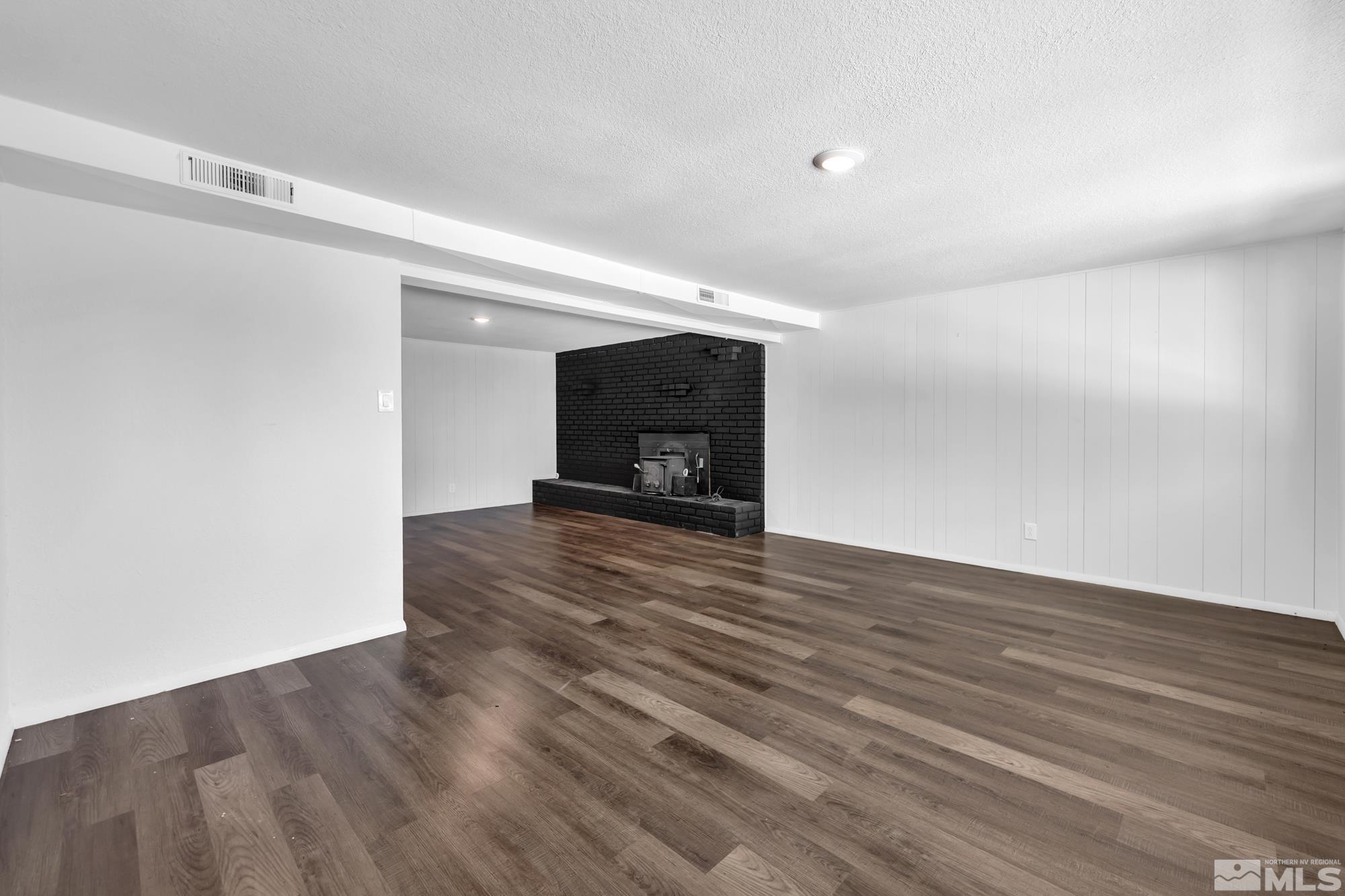 1750 Carlin Street Reno, NV 89503 - Photo 21 of 38 a view of empty room with wooden floor