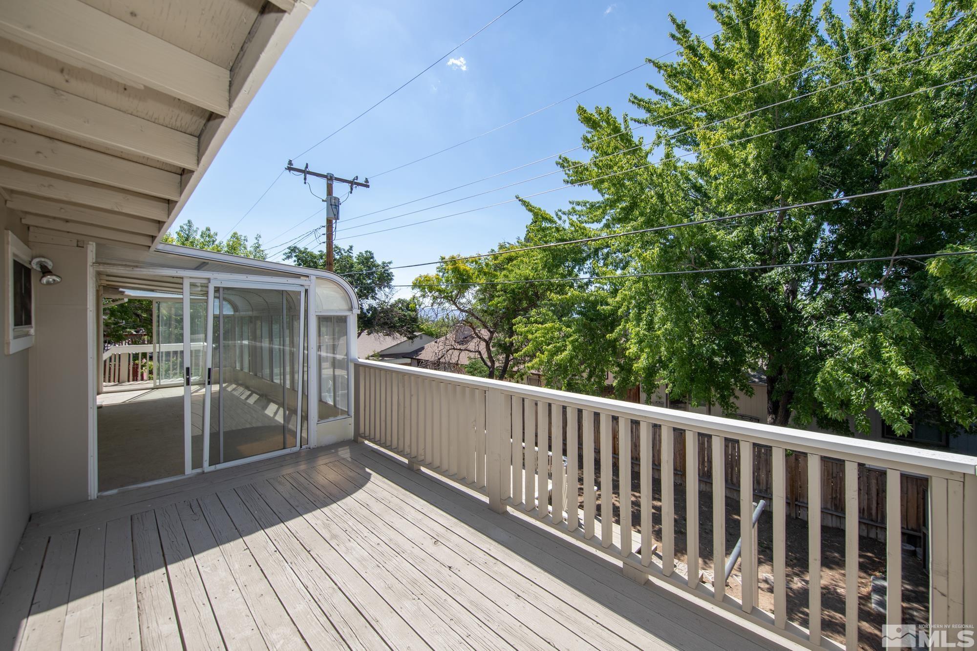 1750 Carlin Street Reno, NV 89503 - Photo 28 of 38 a view of a balcony with wooden floor