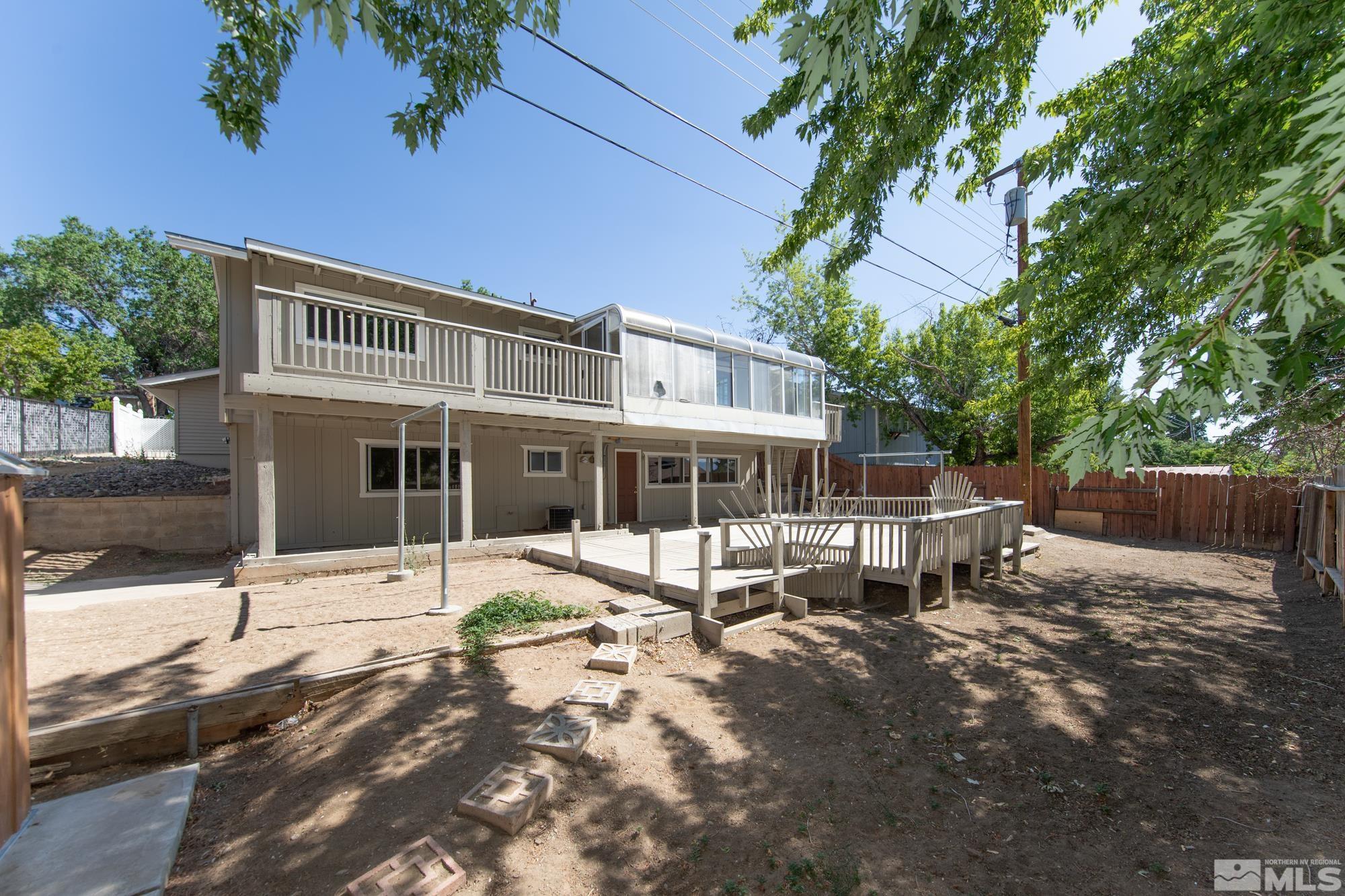 1750 Carlin Street Reno, NV 89503 - Photo 32 of 38 a front view of a house with a yard