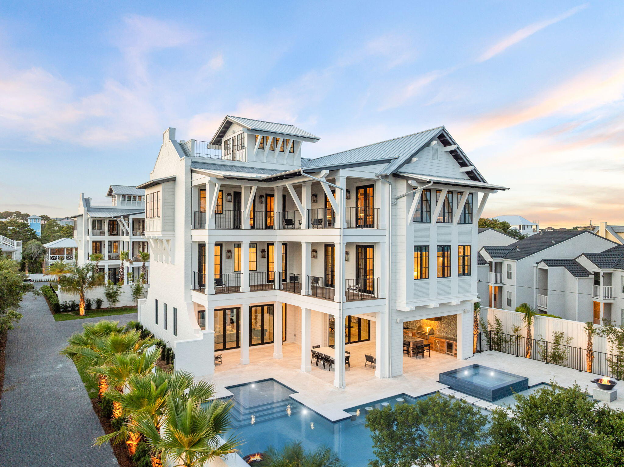 a front view of a residential apartment building with a yard