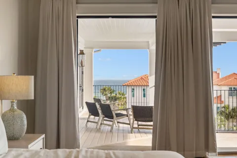 a view of a livingroom with furniture and front door