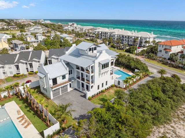 a view of a city with lawn chairs