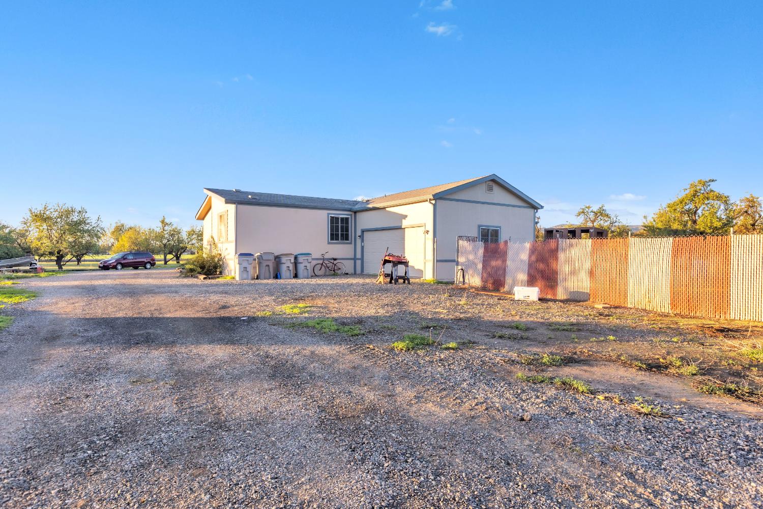25752 State Highway Esparto, CA 95627 - Photo 11 of 60 a view of a house with a yard and a large tree