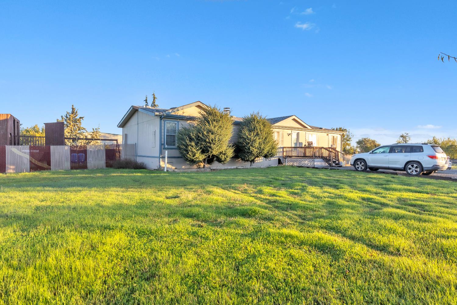 25752 State Highway Esparto, CA 95627 - Photo 14 of 60 a view of a big house with a big yard and large trees