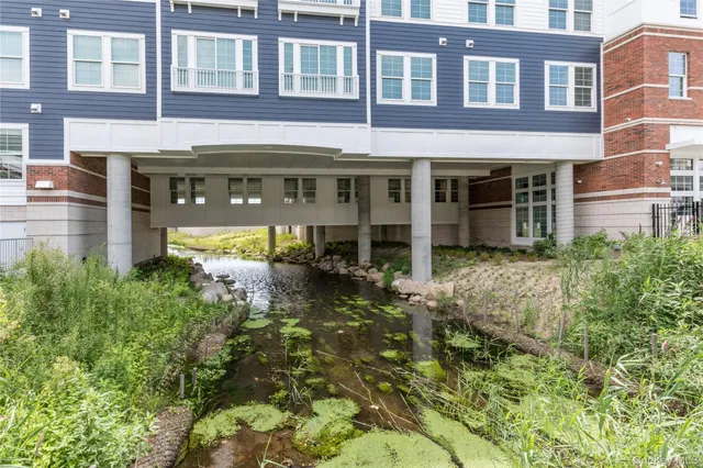 a view of a building with a yard