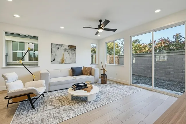 a view of a kitchen with a sink and microwave
