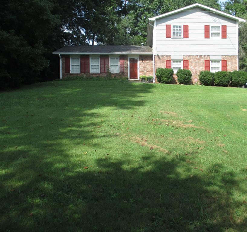 1112 Martin Nash Road Southwest Lilburn, GA 30047 - Photo 1 of 1 Beautiful large front yard!