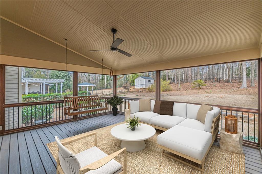 420 Junction Track Roswell, GA 30075 - Photo 34 of 45 a living room with furniture and a large window