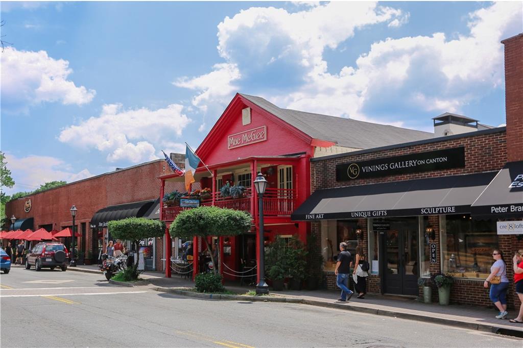 420 Junction Track Roswell, GA 30075 - Photo 40 of 45 a view of street with shops and trees