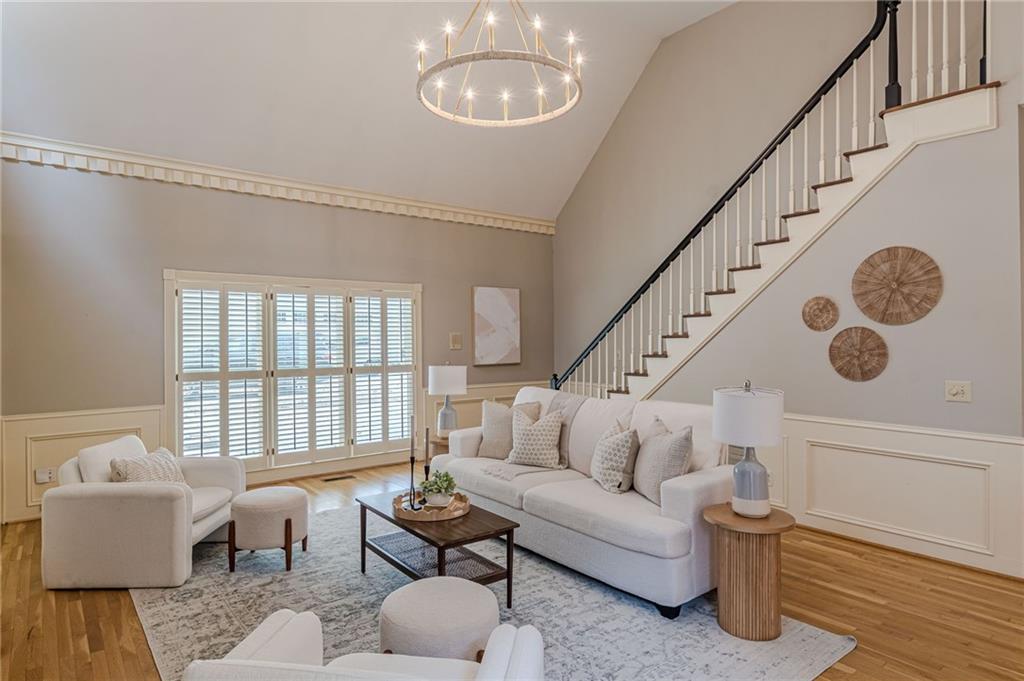 420 Junction Track Roswell, GA 30075 - Photo 4 of 45 a living room with furniture and wooden floor