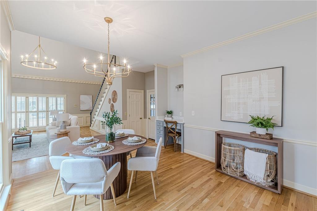 420 Junction Track Roswell, GA 30075 - Photo 9 of 45 a view of a dining room with furniture window and wooden floor
