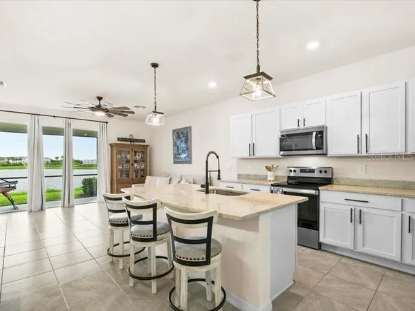 a view of storage and utility room with dryer and washer