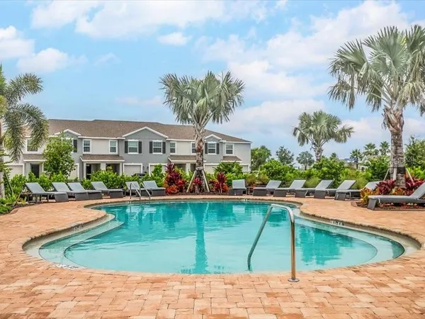 a view of a terrace with furniture