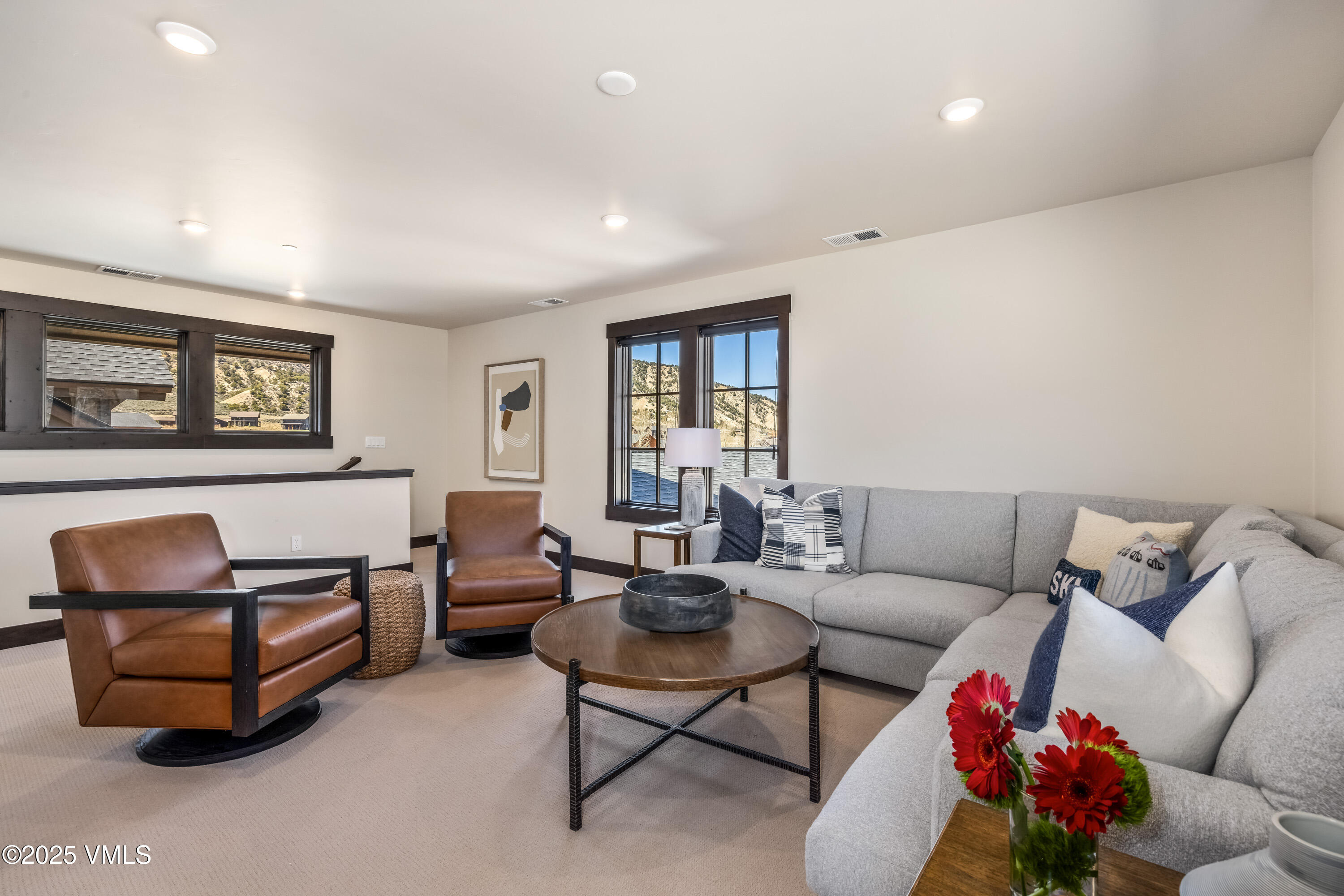 687 Hunters View Lane Eagle, CO 81631 - Photo 19 of 43 a living room with furniture and a window