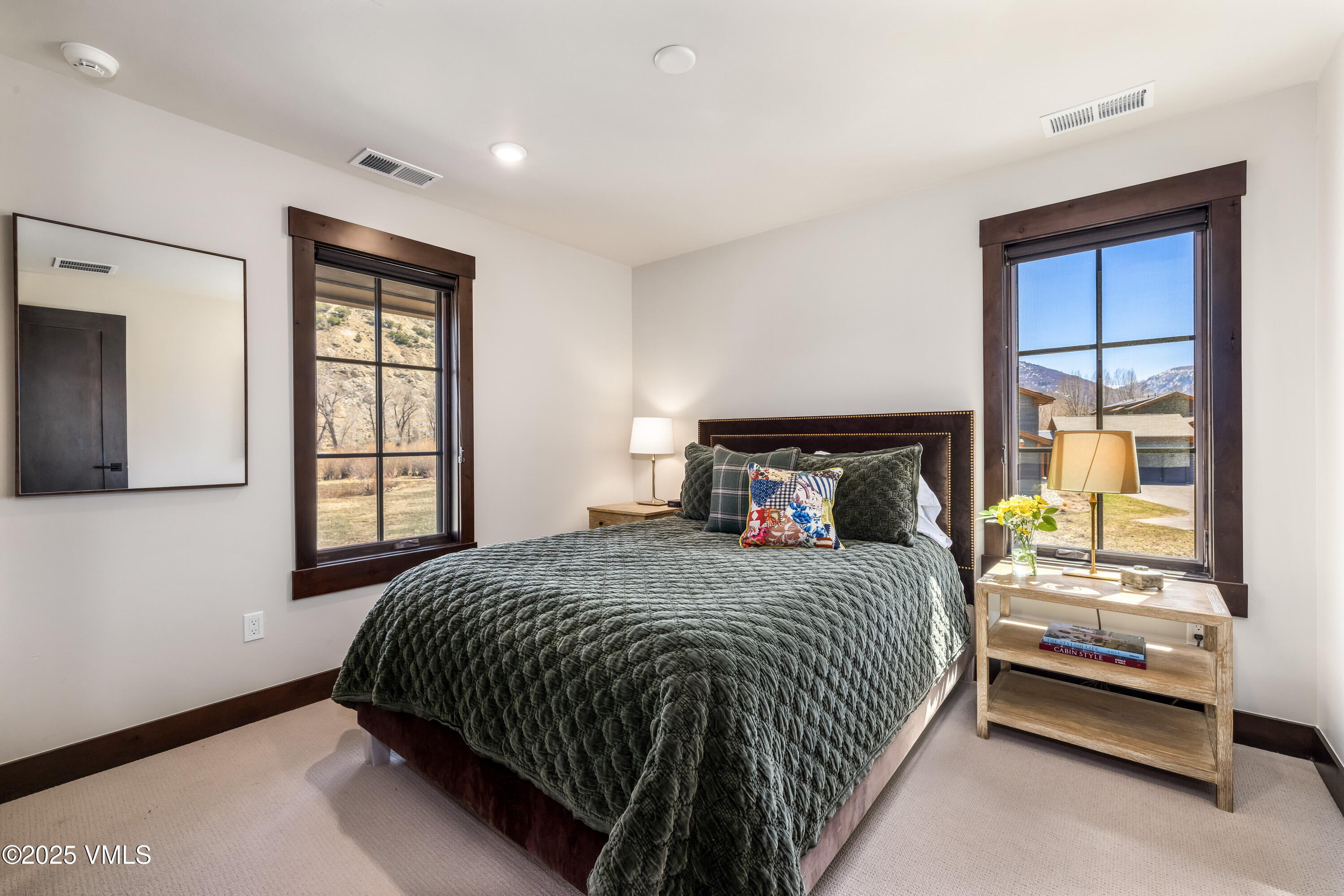 687 Hunters View Lane Eagle, CO 81631 - Photo 20 of 43 a bedroom with a bed and a window