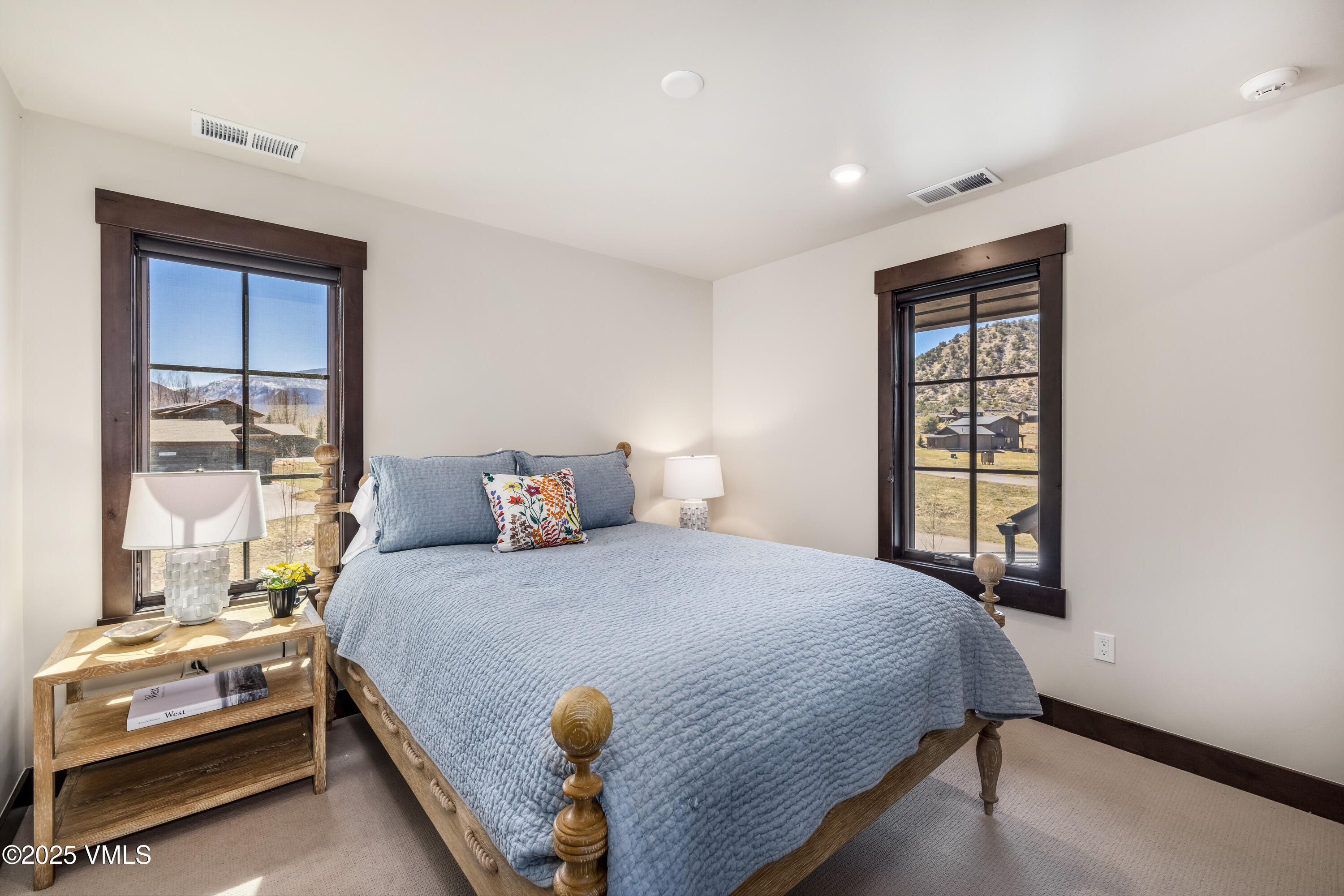 687 Hunters View Lane Eagle, CO 81631 - Photo 21 of 43 a bedroom with a bed and window