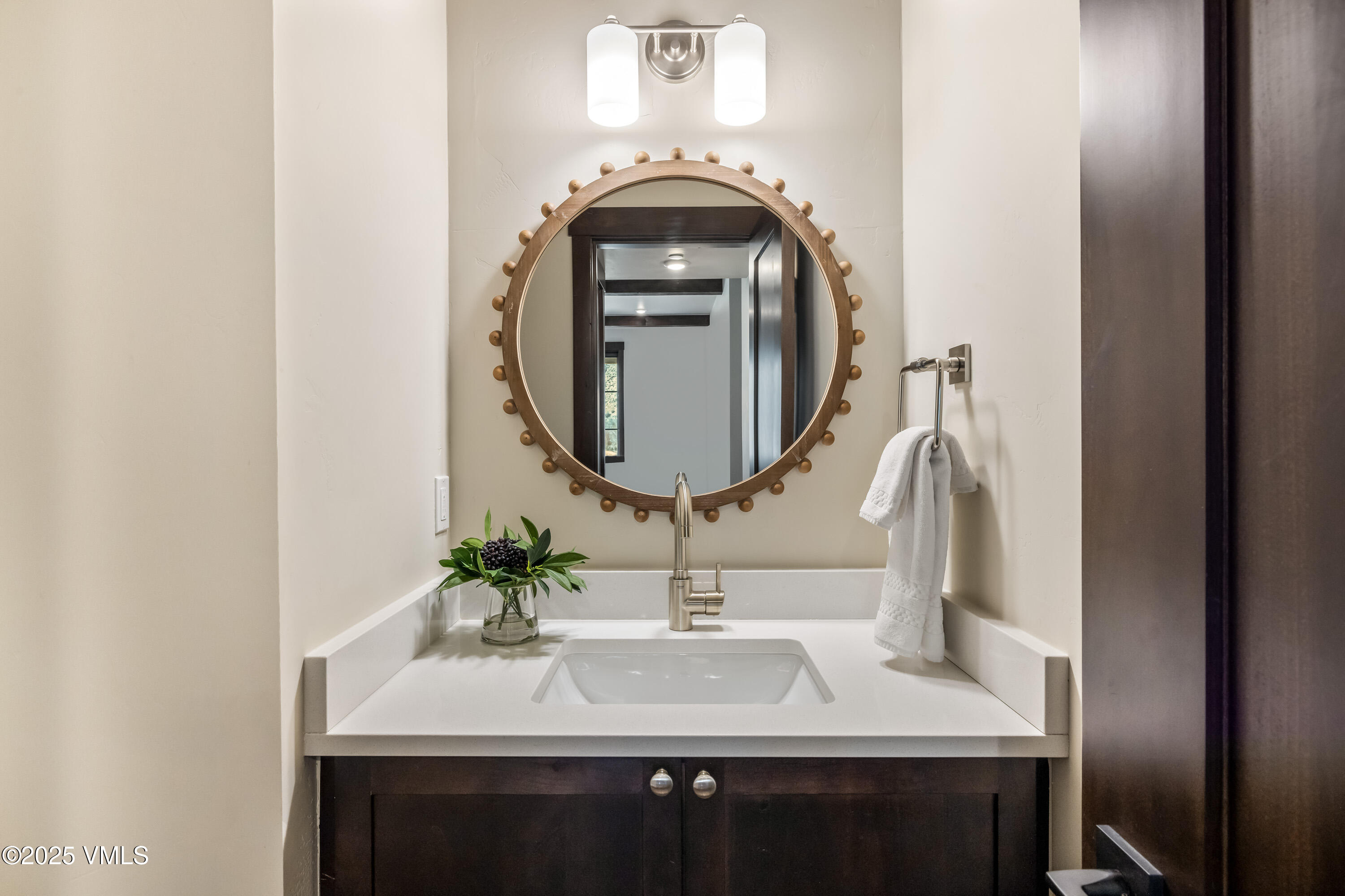 687 Hunters View Lane Eagle, CO 81631 - Photo 27 of 43 a bathroom with a sink and a mirror