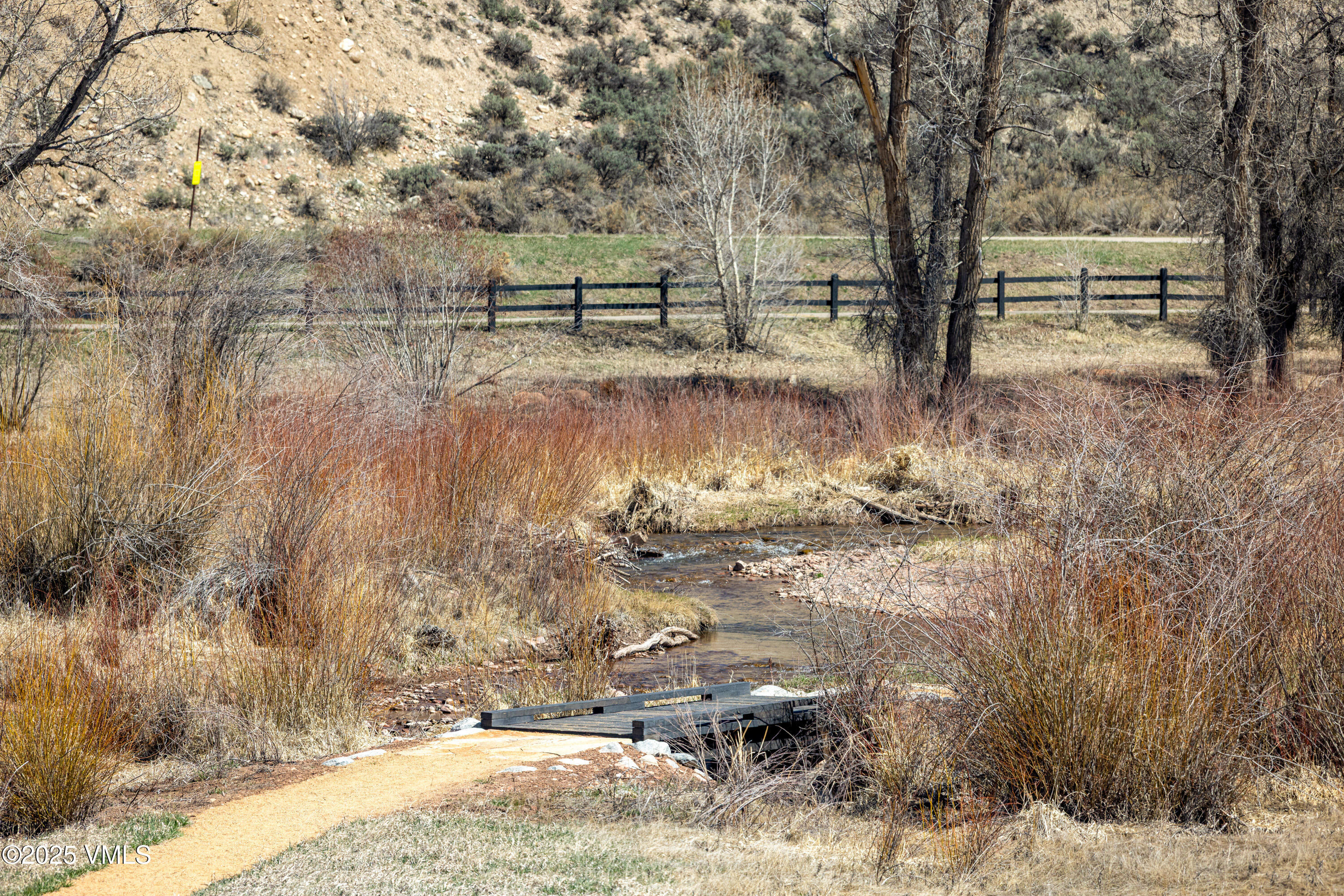 687 Hunters View Lane Eagle, CO 81631 - Photo 28 of 43 a view of a yard with wooden fence
