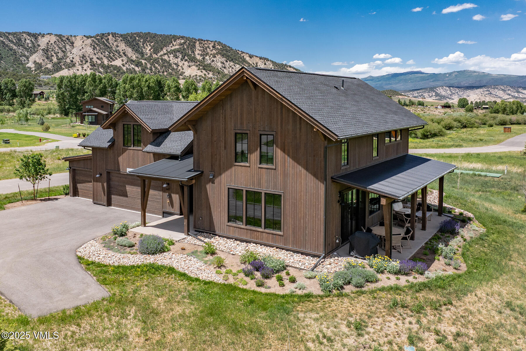 687 Hunters View Lane Eagle, CO 81631 - Photo 37 of 43 a house view with a garden space