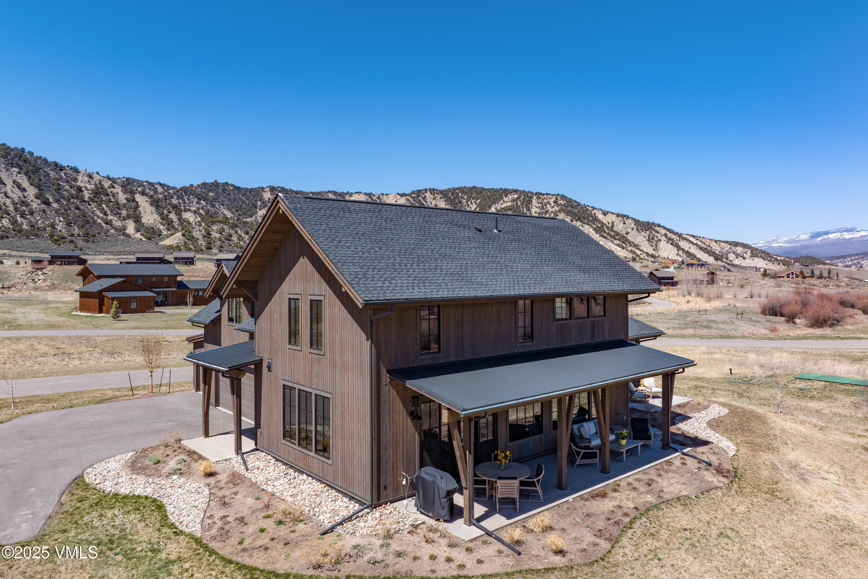 687 Hunters View Lane Eagle, CO 81631 - Photo 40 of 43 a view of a house with a wooden fence