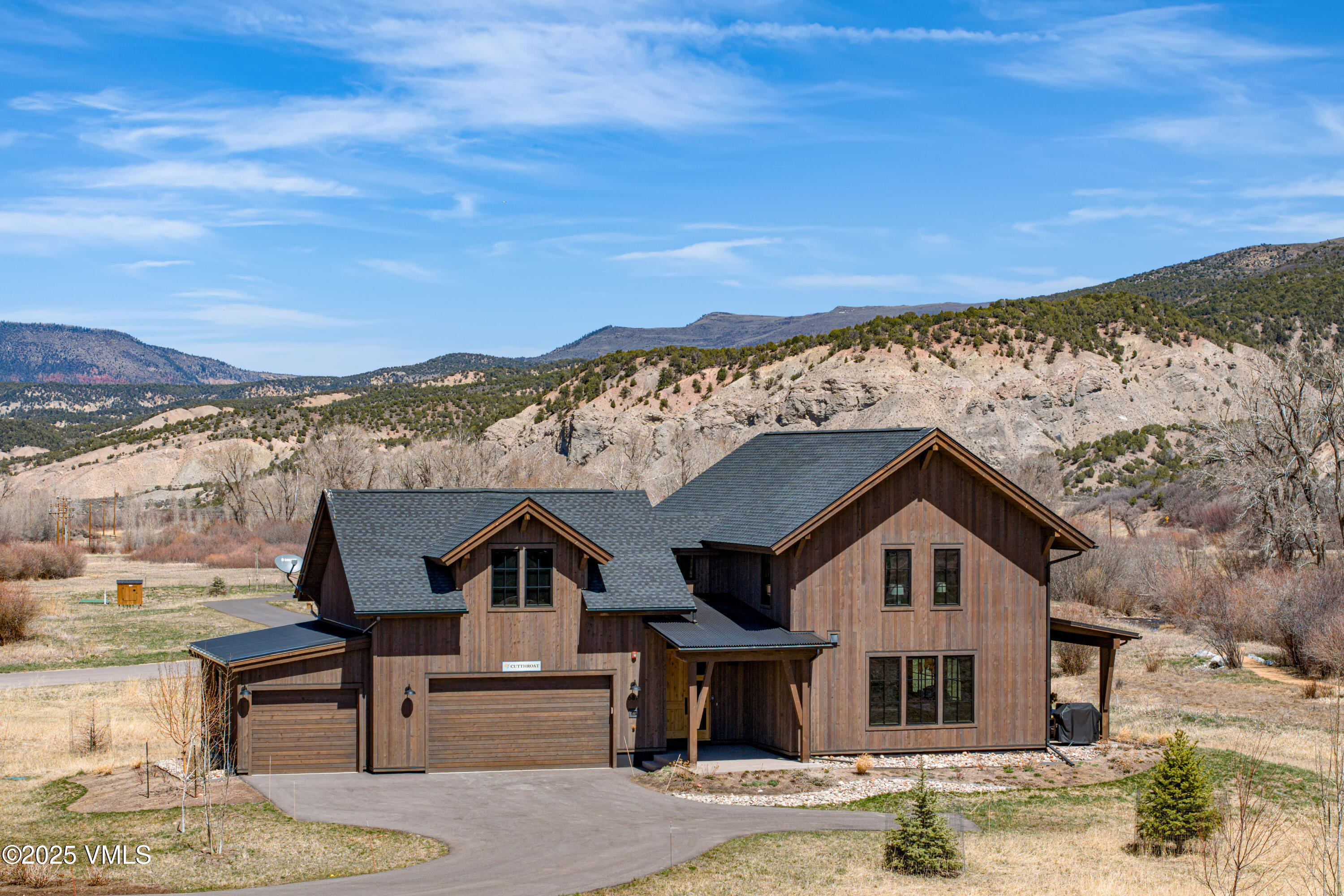 687 Hunters View Lane Eagle, CO 81631 - Photo 41 of 43 a front view of a house with a yard