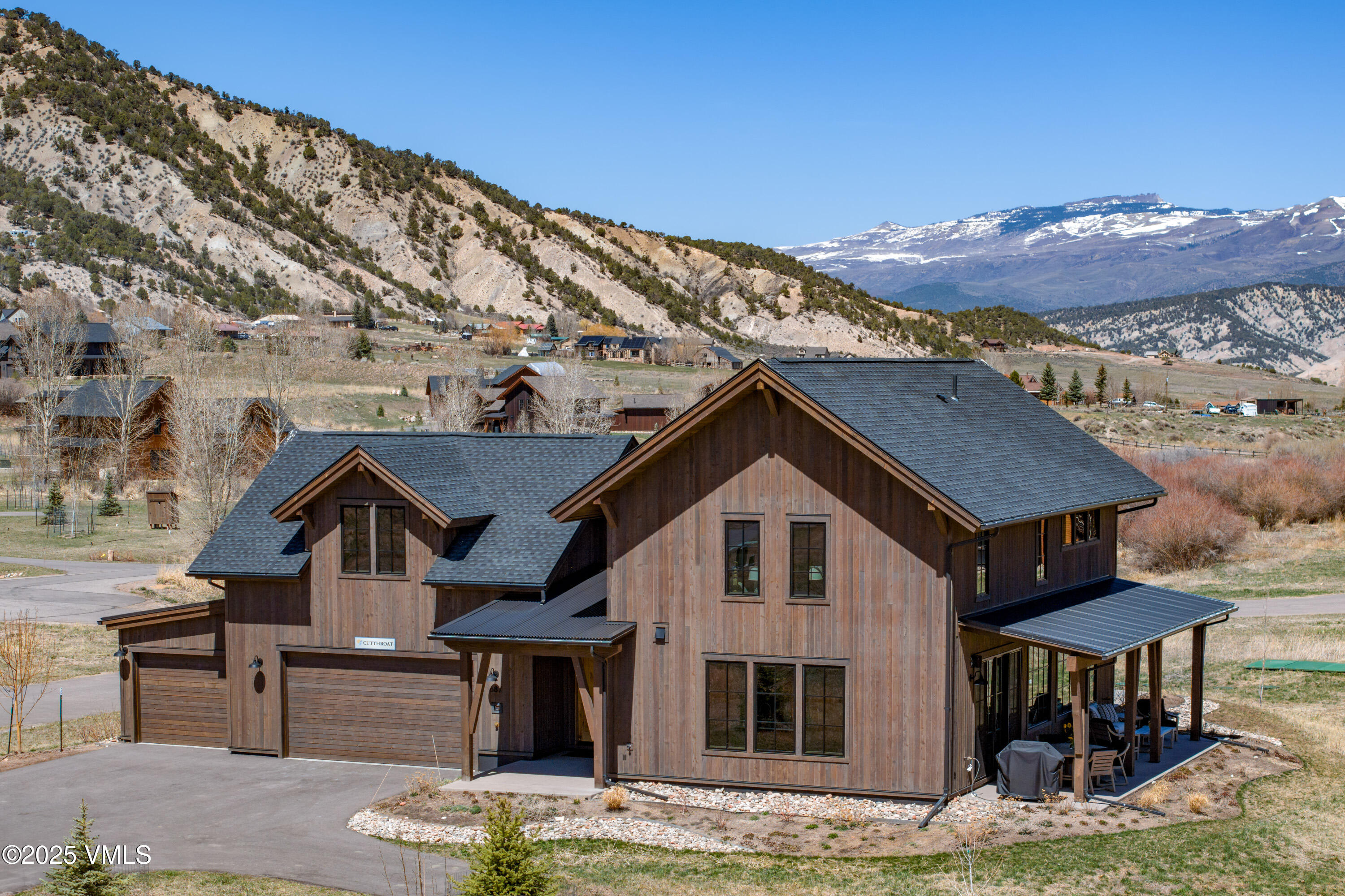 687 Hunters View Lane Eagle, CO 81631 - Photo 42 of 43 a aerial view of a house next to a yard