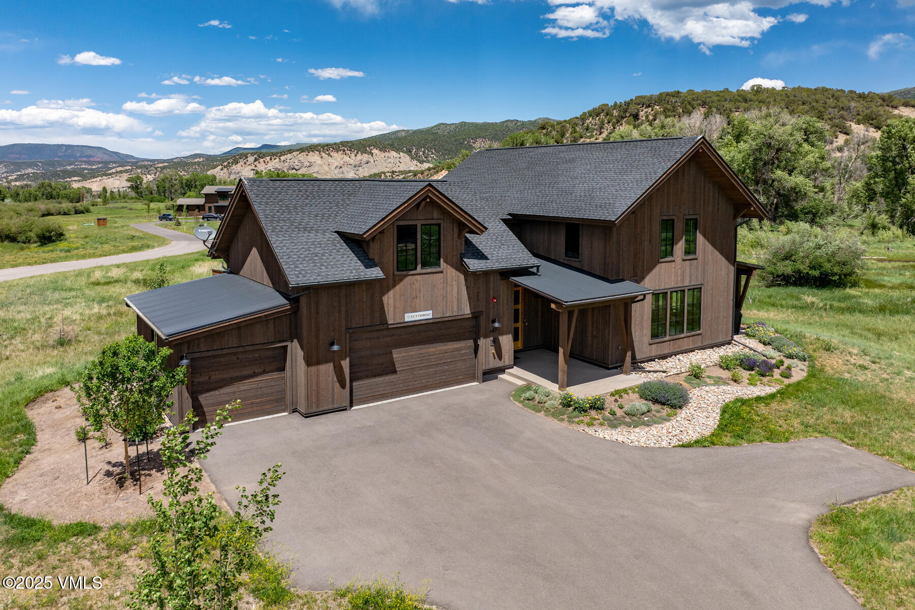 687 Hunters View Lane Eagle, CO 81631 - Photo 5 of 43 an aerial view of a house with a yard