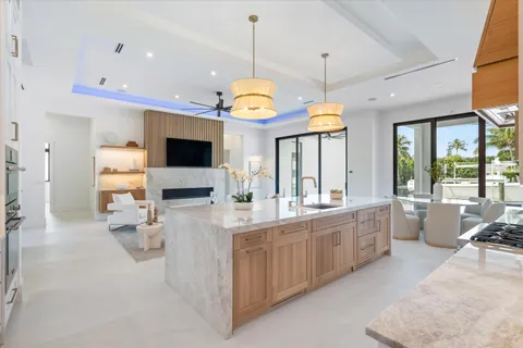 a large bathroom with a large tub and sink