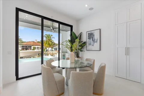 a view of kitchen with furniture and large window