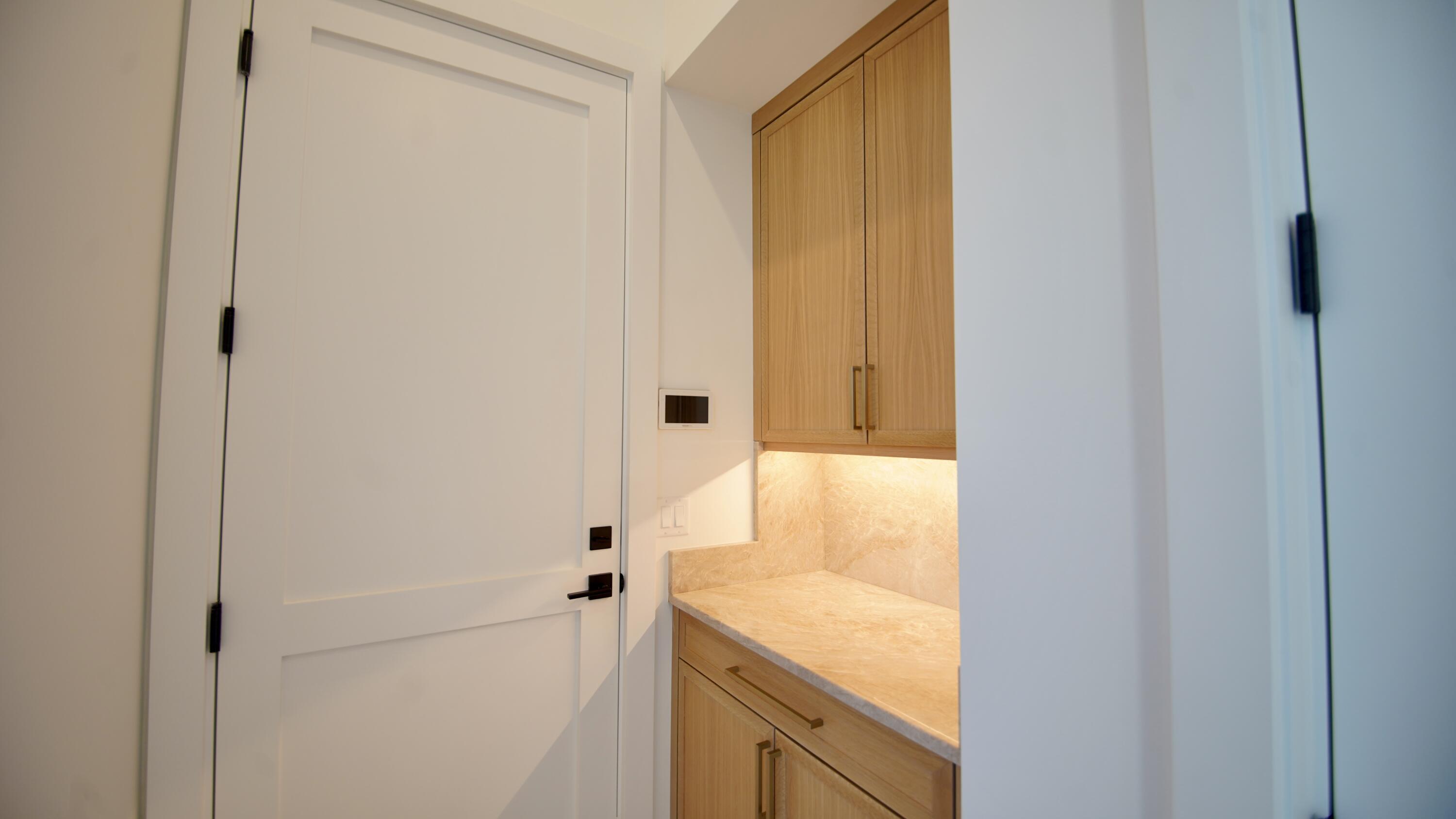 11331 Avery Road Palm Beach Gardens, FL 33410 - Photo 69 of 110 a bathroom with a granite countertop sink and a bathtub