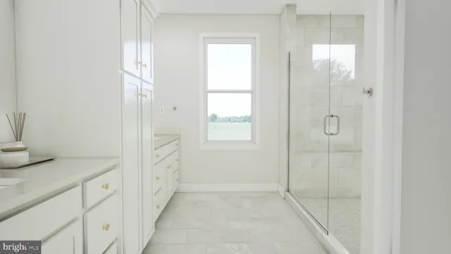 a spacious bathroom with a shower