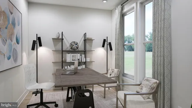 a view of a dining room with furniture and window