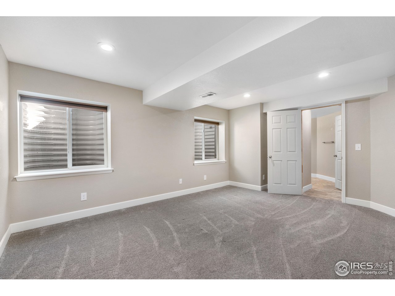 5865 Quarry Street Timnath, CO 80547 - Photo 28 of 47 a view of an empty room with a window