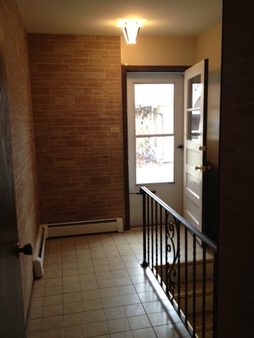10909 Rutherford Avenue Worth, IL 60482 - Photo 2 of 9 a view of entryway with a window