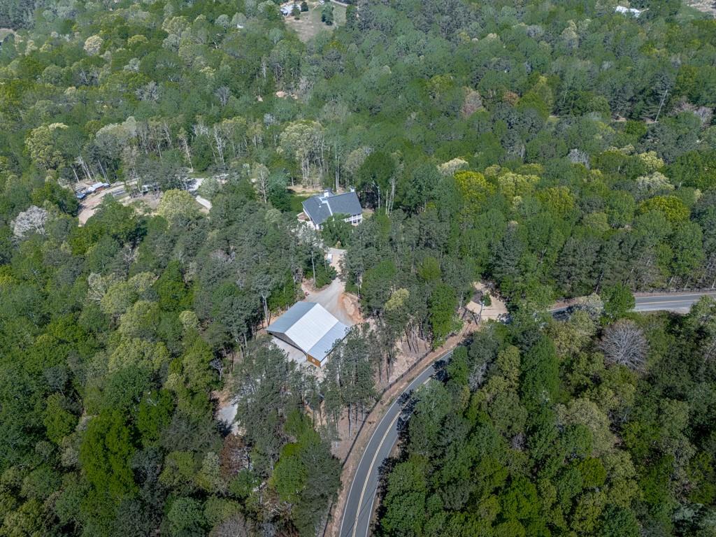1141 Addington Lane Waleska, GA 30183 - Photo 103 of 105 a aerial view of a house with a yard and outdoor seating