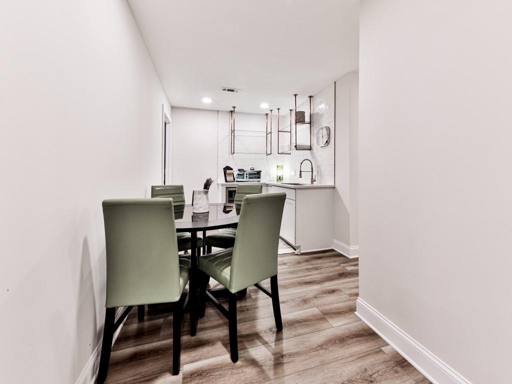1141 Addington Lane Waleska, GA 30183 - Photo 12 of 105 a view of a dining room with furniture and wooden floor