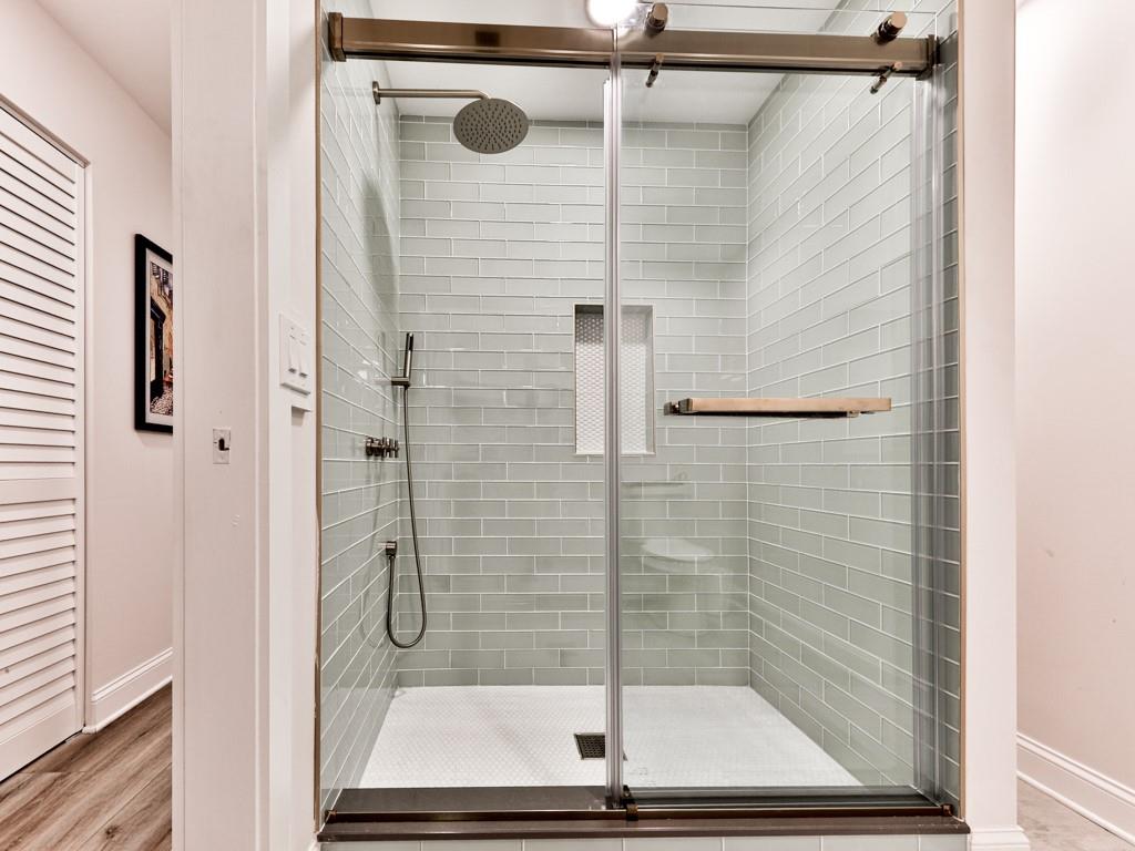 1141 Addington Lane Waleska, GA 30183 - Photo 14 of 105 a bathroom with a glass shower door