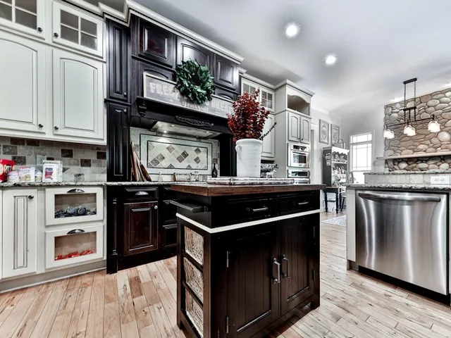 a bathroom with a toilet and a shower curtain