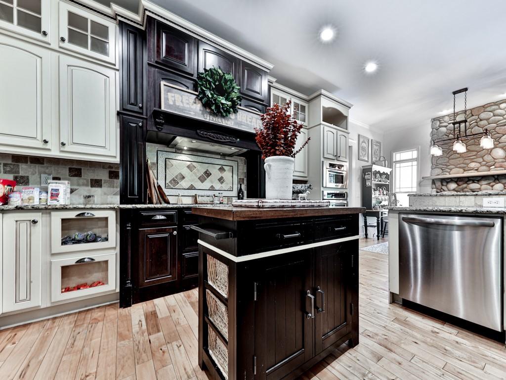1141 Addington Lane Waleska, GA 30183 - Photo 25 of 105 a kitchen with stainless steel appliances granite countertop a stove and a sink
