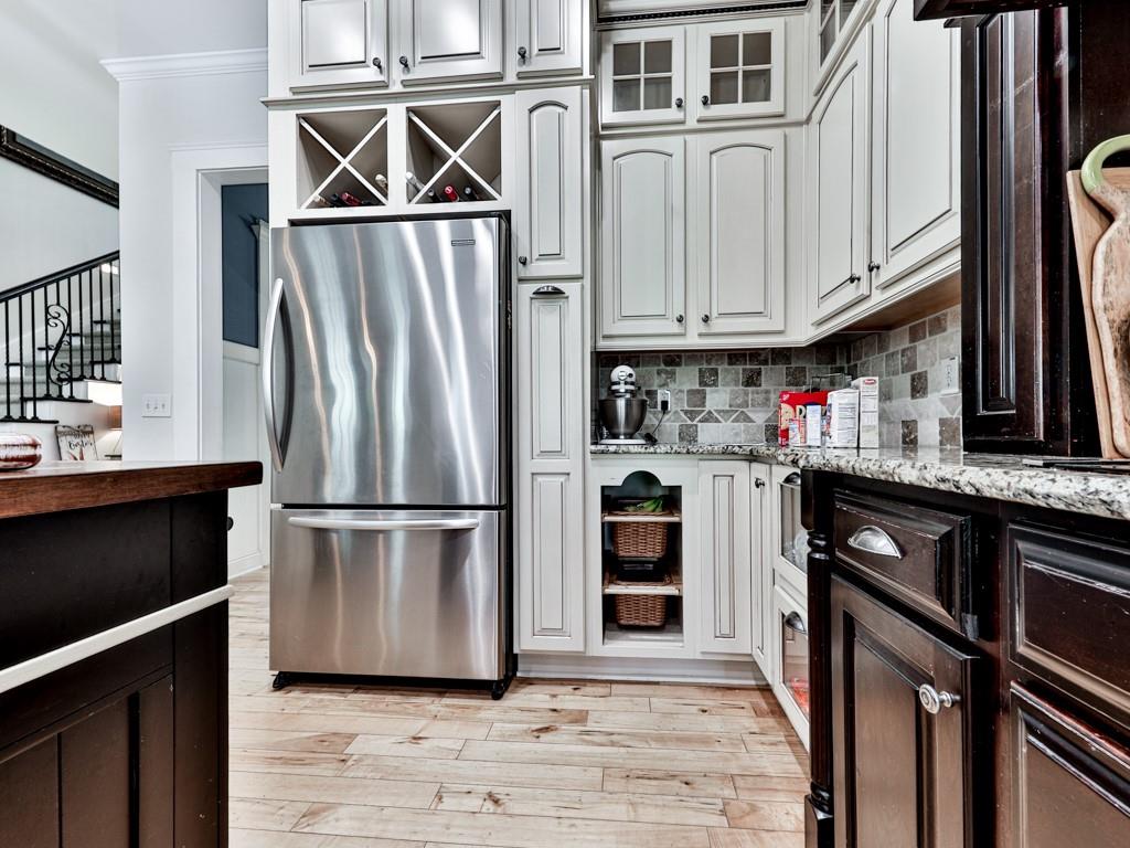 1141 Addington Lane Waleska, GA 30183 - Photo 26 of 105 a kitchen with stainless steel appliances a refrigerator and a stove top oven
