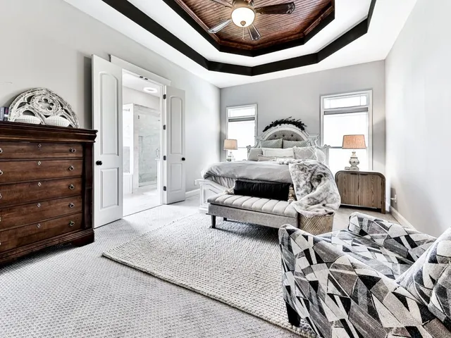 a utility room with cabinets dryer and washer