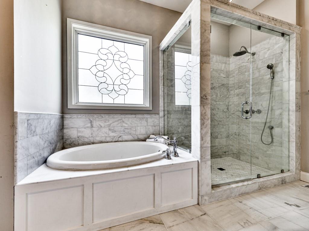 1141 Addington Lane Waleska, GA 30183 - Photo 32 of 105 a bathroom with a sink a mirror and a bathtub