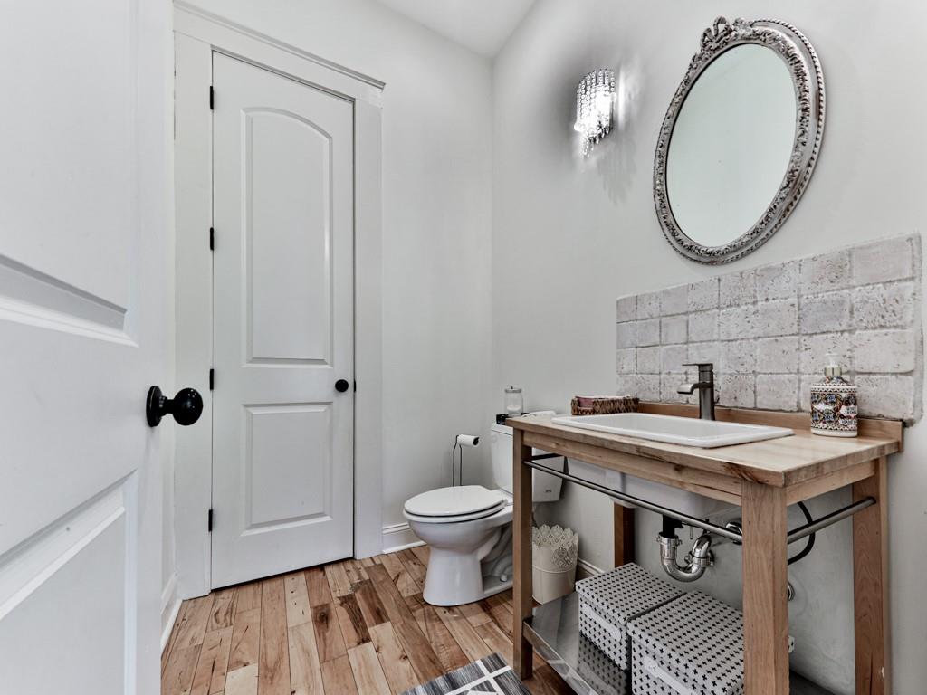1141 Addington Lane Waleska, GA 30183 - Photo 36 of 105 a bathroom with a sink a toilet and a mirror