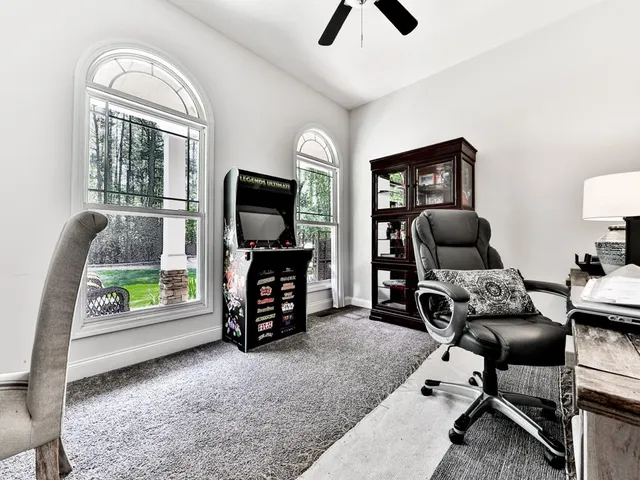 a white toilet sitting next to a bathroom sink