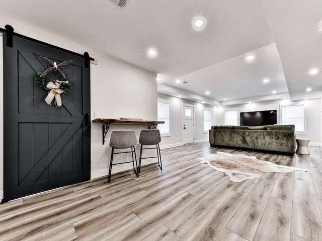a view of a entryway with wooden floor