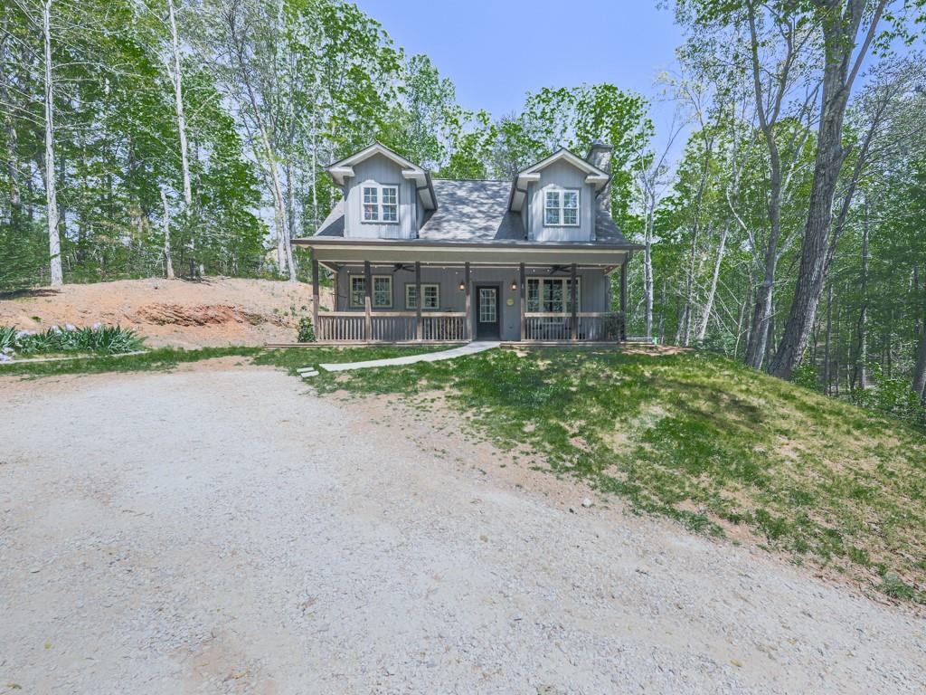 1141 Addington Lane Waleska, GA 30183 - Photo 96 of 105 a front view of a house with garden