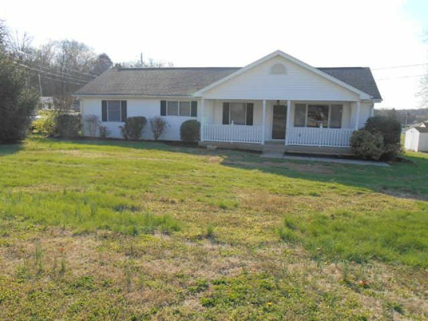 3101 Curd Road Mount Juliet, TN 37122 - Photo 2 of 14 a view of a yard with a table and chairs under an umbrella
