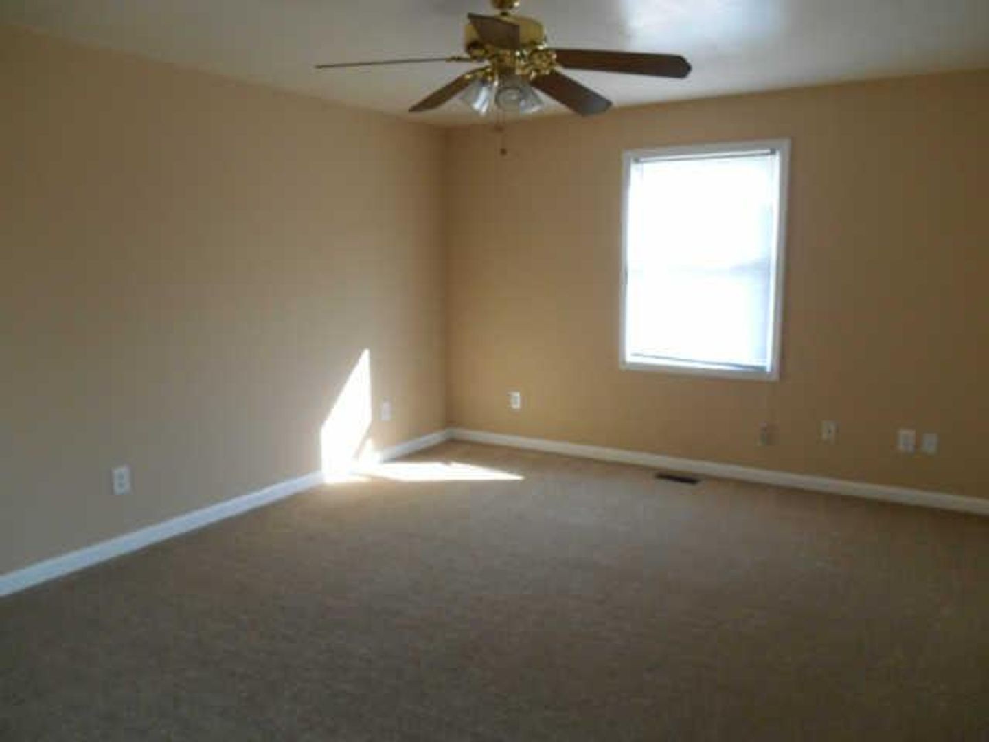 3101 Curd Road Mount Juliet, TN 37122 - Photo 7 of 14 en empty room with windows and chandelier fan