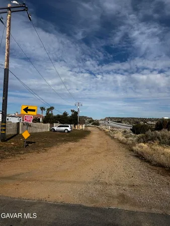 a view of staircase with white walls