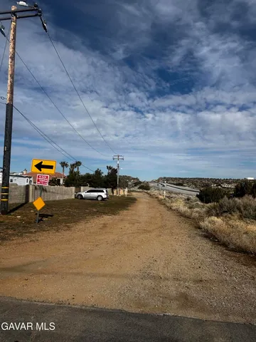 a view of staircase with white walls